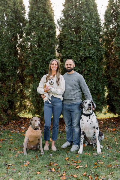 Danielle and her husband with their 3 dogs