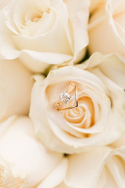 wedding ring image in beautiful white roses