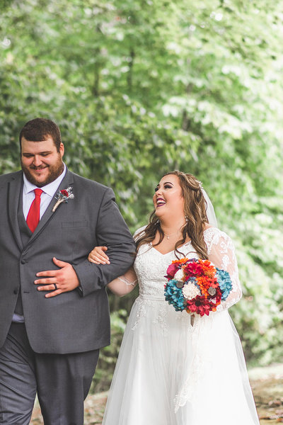 Bride and groom share moment on wedding day captured by nc wedding photographer