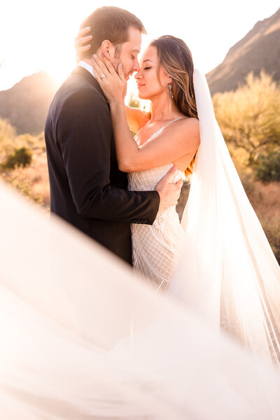 Bride & Groom embrace during their wedding in Tucson, Arizona. Photo Taken by Austin Wedding Photographers, Joanna & Brett