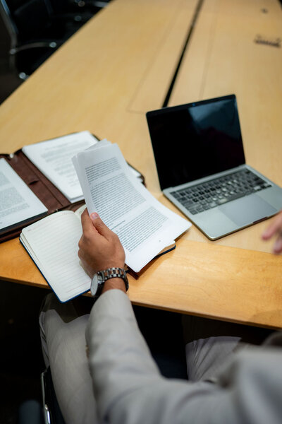 Columbus Ohio family law attorney reviewing documents and developing a legal strategy for a client’s case
