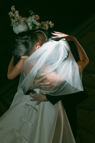Bride and groom's intimate moment captured by Oahu wedding photographer