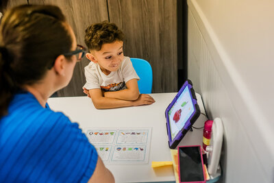 child in speech therapy session in Dixon CA focused on communication and articulation