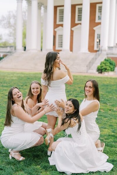 Senior girls in white dresses