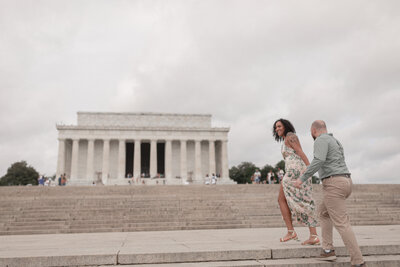 bride and groom holding hands walking