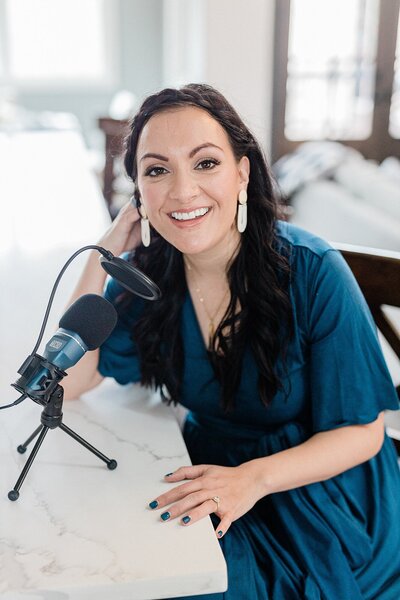 Dolly DeLong of Dolly DeLong Photography and Education is sitting down to record another podcast for her educational podcast the systems and workflow magic podcast for a branding photography session