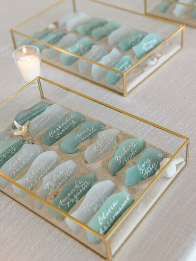 Sea glass escort cards with white ink calligraphy for Newport, Rhode Island wedding