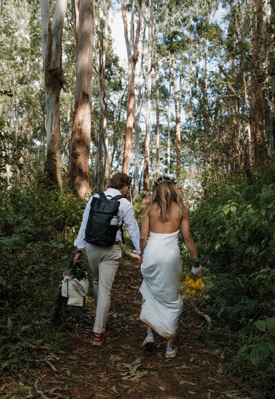 bride and groom on kauai hiking kuilau ridge trail