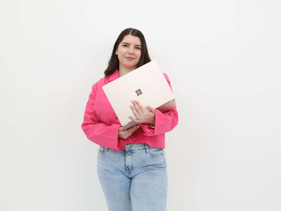 Social media manager in Houston working on laptop