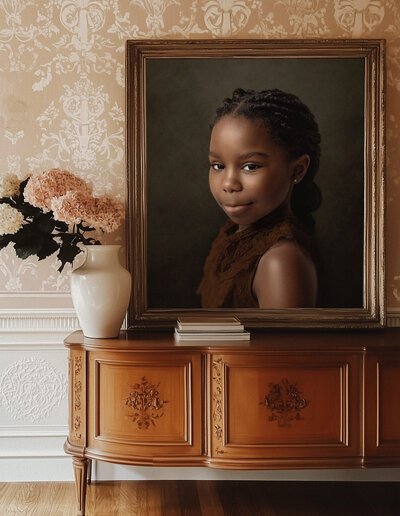 Framed fine art portrait of a young boy created through children’s portrait photography