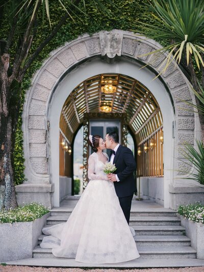 Wedding portraits in front of arch during Grand Hotel Tremezzo wedding, by Lake Como Wedding Photographer Andreas K. Georgiou