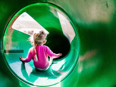 Outdoor Photo going down slide at the park