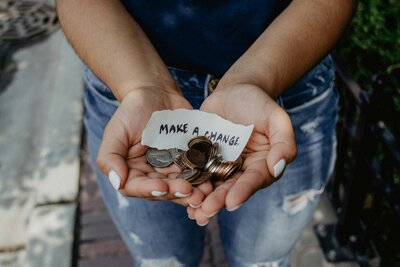 woman donating change