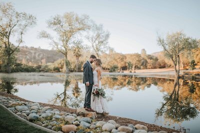 Lake Tahoe Elopement Photographer captures bride and groom portraits by water