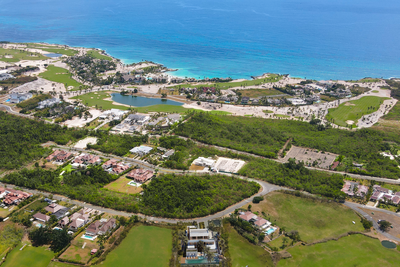 Resort buildings and crystal-clear water seen from above in Punta Cana, Dominican Republic