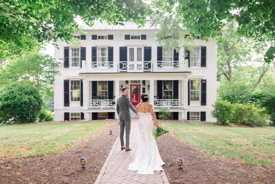 Groom walking bride to the main house on Guildford Farm. Taken by Washington DC Wedding Photographer Bethany Aubre Photography.