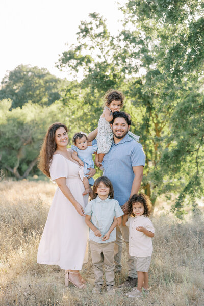 Fresno couple celebrating pregnancy with joyful, emotional portraits