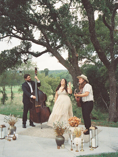 Mikaela Kahn and her husband performing live music with a cello accompaniment 