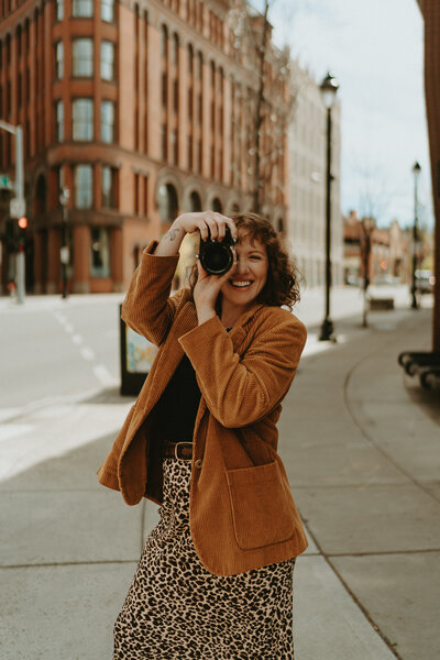 A portrait of Blair Voss, a Spokane-based wedding and elopement photographer specializing in cinematic, storytelling photography that captures authentic love and connection.