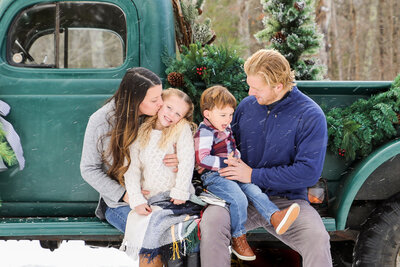Family Photo with truck and Mom kissing daughter on cheek | Family Photo Session