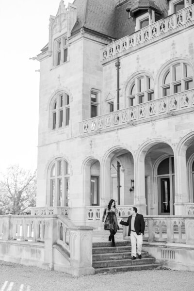 couple walking on the steps of Ochre Court