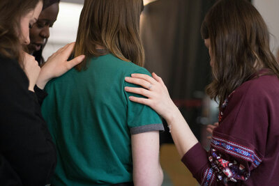 women praying together