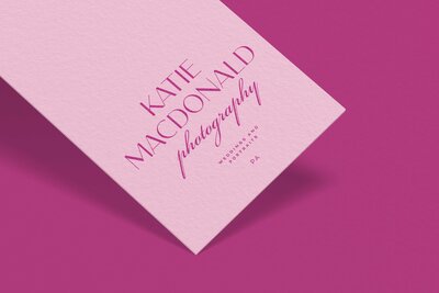 Logo for Katie MacDonald Photography on the bottom of a paper