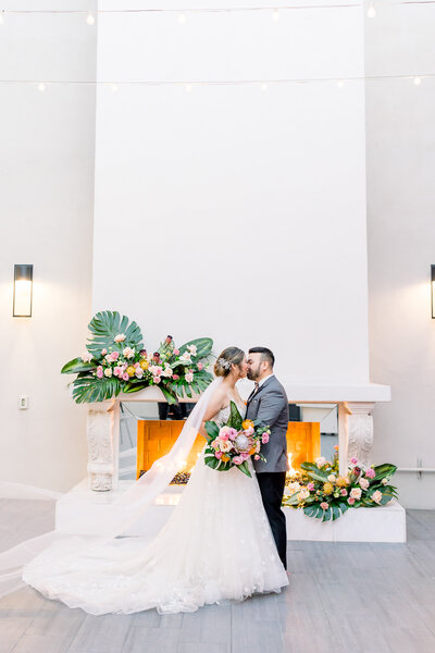 soho63-chandler-wedding-venue-bride-and-groom-tropical-florals