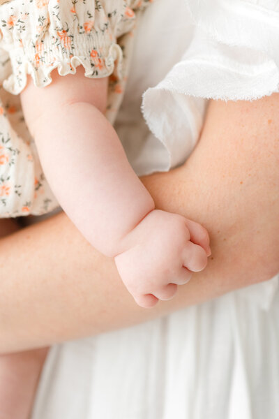 A closeup photo of a baby's hands by washington dc baby photographer