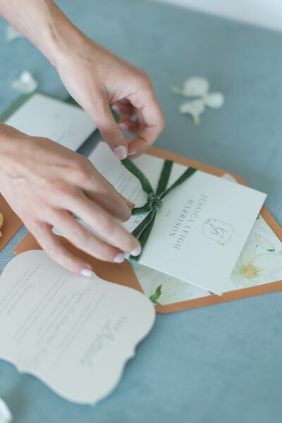 terra cotta wedding invitation suite with floral envelope liner