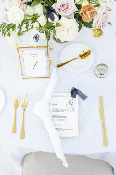 Wedding reception place setting at South Coast Winery in Temecula, California by Sherr Weddings Photography & Videography.