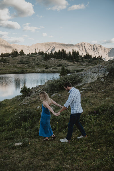 A couple takes their engagement photos in Colorado during the summer time.