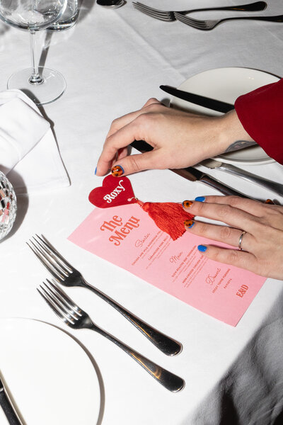 Emma styling some wedding table decor & menu for an Irish wedding 