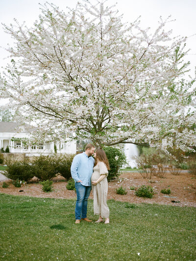 couple at huntsville botanical garden at maternity session by huntsville alabama photographers fauna & film