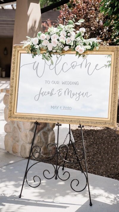 calligraphy welcome sign at wedding