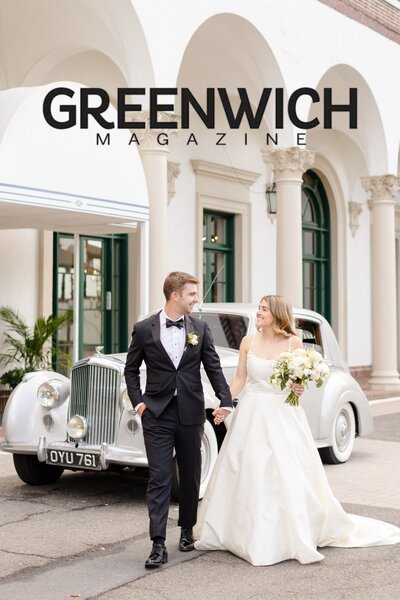 Bride and groom holding hands walking in front of a vintage Rolls Royce at Westchester Country Club