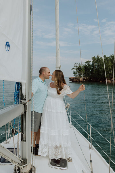 bride and groom on a sailboat