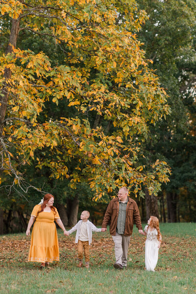 Photographer in Blacksburg, Virginia, Melena Lawson, and her family during a photo session.