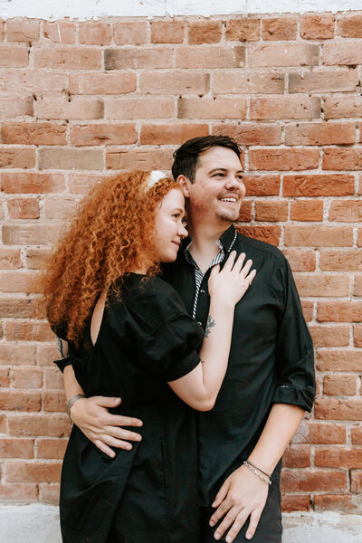 couple walking and laughing