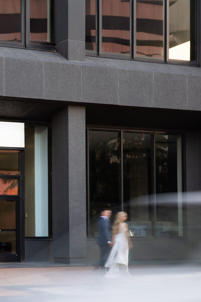 bride and groom walking away
