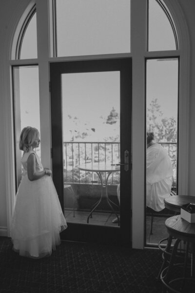 flower girl looking at bride at the atticus hotel