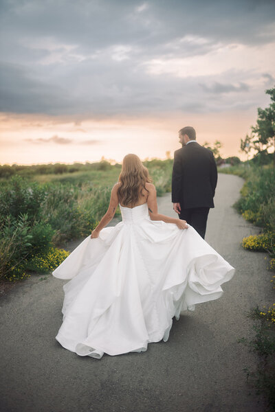 bride and groom kiss on wedding day