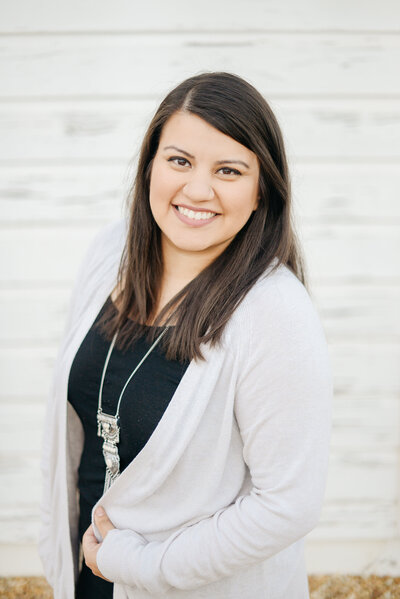 Carla owner of judith photography specializes in weddings and portraits