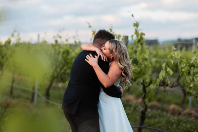 The groom's warm embrace made our bride's day truly unforgettable.