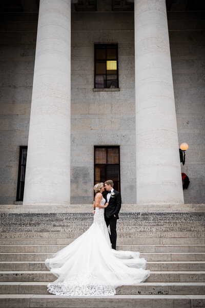 Experience the timeless elegance of bridal portraits taken at Columbus Court House. Featuring the beautiful architecture and natural light of the courthouse, these photos highlight the sophistication and grandeur ideal for any bride's special day.