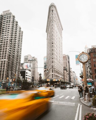 The iconic Flatiron scene illustrates the busyness of New York life. LightLine’s Insights & Resources section offers grounding, practical tools for navigating stress, burnout, and personal growth in an always-on city.