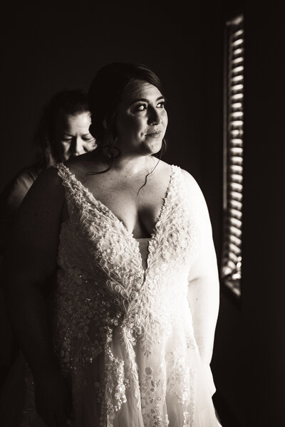 Wedding photography at Our Savior Lutheran Church in Minot, ND, capturing intimate and timeless moments on the couple's special day. Chelise Boysun expertly documents love and celebration with stunning and emotional portraits.