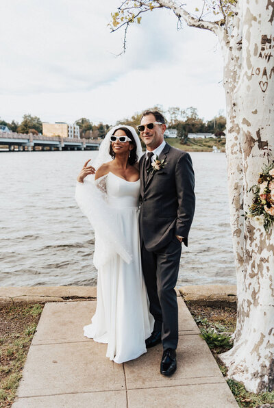 Bride and groom at their waterfront wedding in Red Bank NJ — planned by Well-Dressed Events