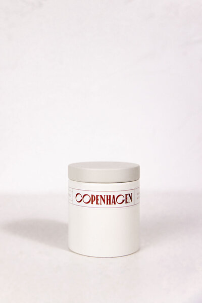 Copenhagen travel themed candle with wood wick and natural soy in a reusable container