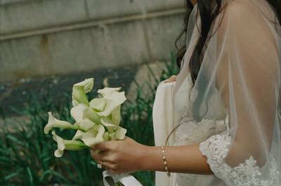 bride holding flowers after elopement ceremony shot by Elsie Goodman Photography | NYC Elopement Packages